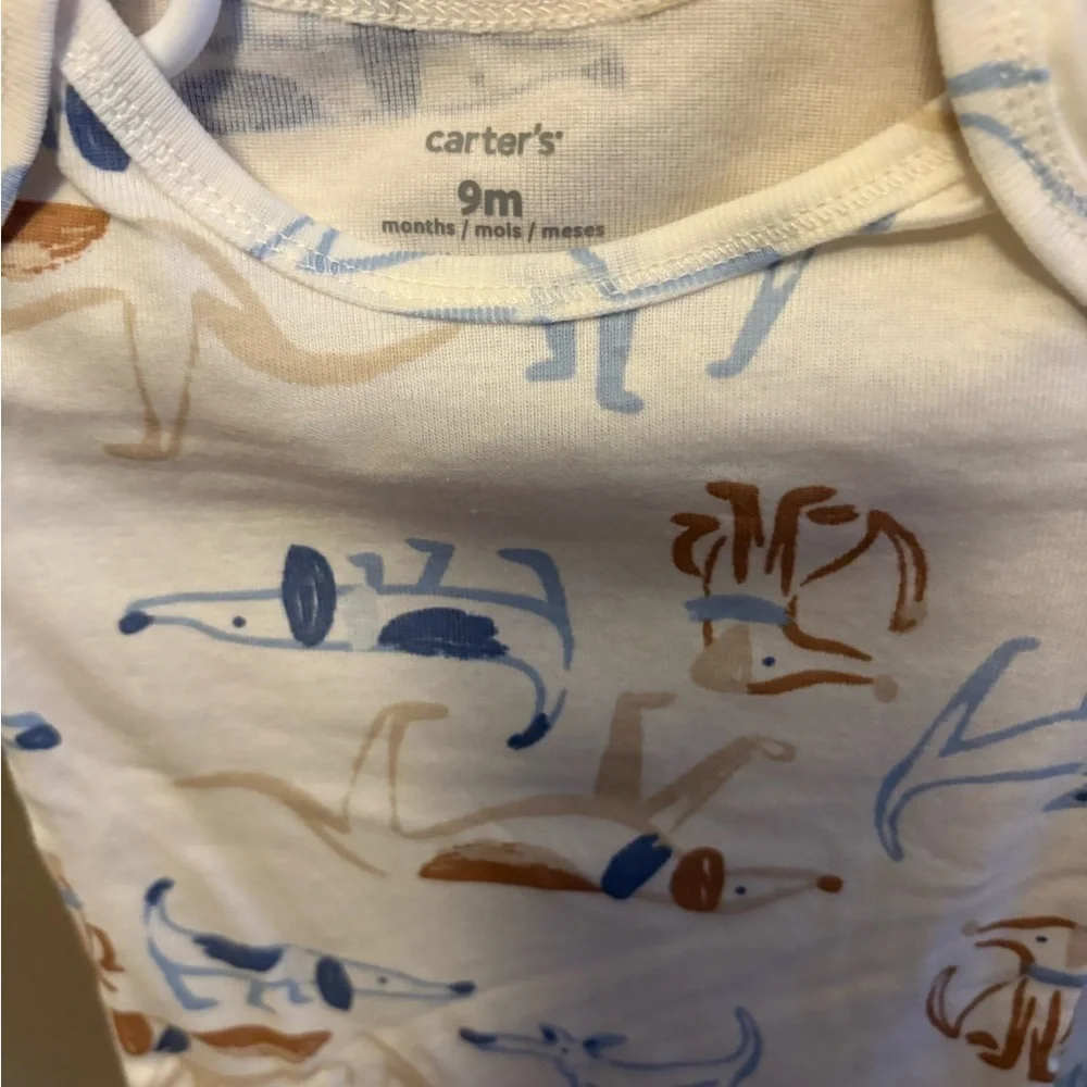 Carter's Cream Bodysuit with Animal Design.  5 size 9 months onesies for $15